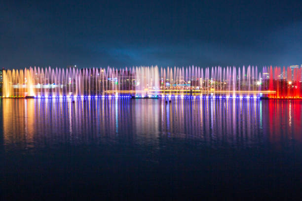 istock Fountain view at midnight park with colorful lights 2163465251