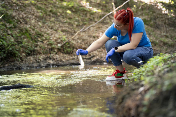 istock A young female biologist scientist taking water sample 2163469030