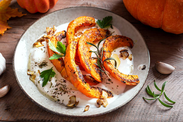 Grilled pumpkin with greek yogurt and herbs