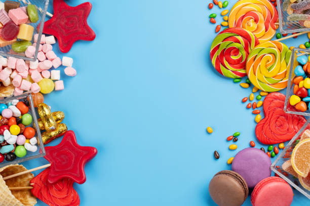 istock Various colorful candies, lollipops, and macaroons 2163472261