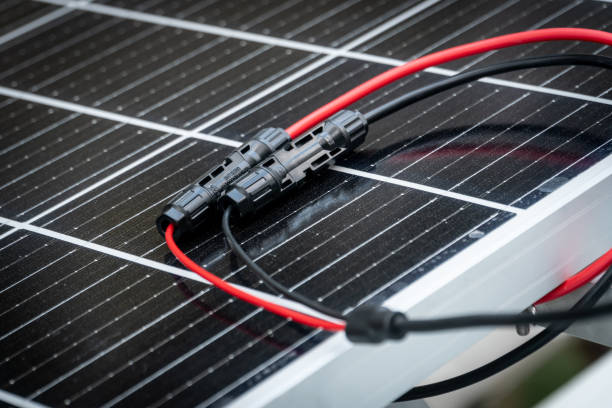 istock Close up of  mc4 connectors over the solar panel. 2163473983