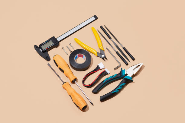 istock Various household tools on beige background. Labor Day concept 2163477743