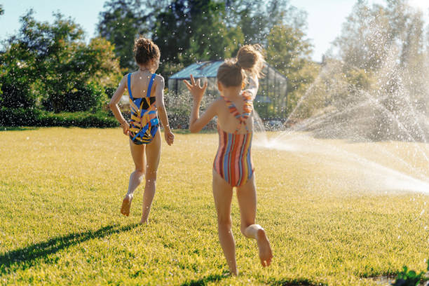 istock Happy family playing in backyard 2163483673