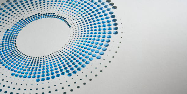 istock Abstract circular cut paper artwork with a gradient of blue dots creating a mesmerizing pattern 2163486715