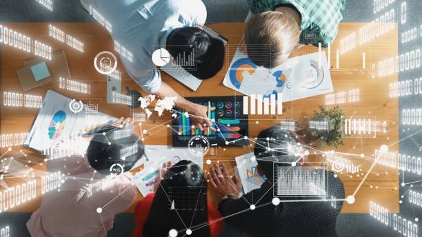 istock Top view of business people working and analyzing investment data. Convocation. 2163489788