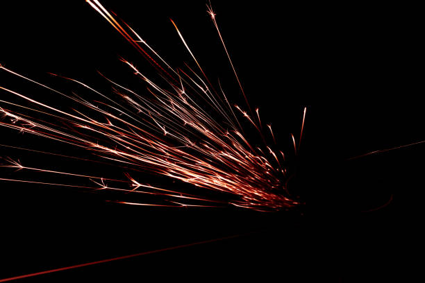 istock red sparks from the grinder glowing in the dark 2163490916