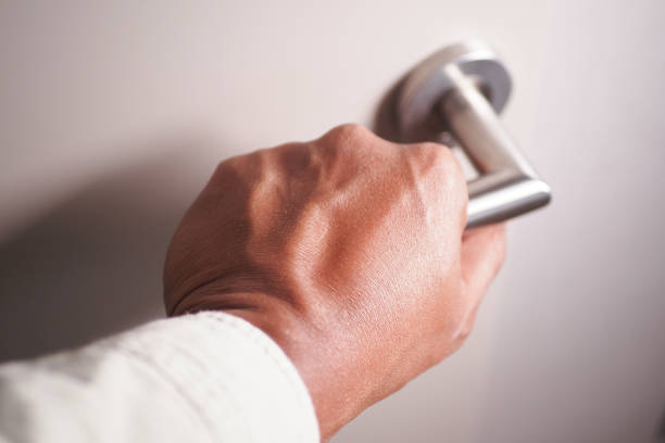istock Man's Hand Opening door close up 2163493267