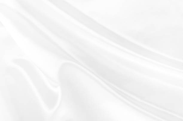 istock White gray satin texture that is white silver fabric silk background with beautiful soft blur pattern natural. 2163496858