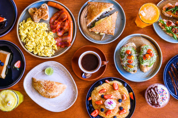 istock Colorful breakfast spread on wooden table 2163499868