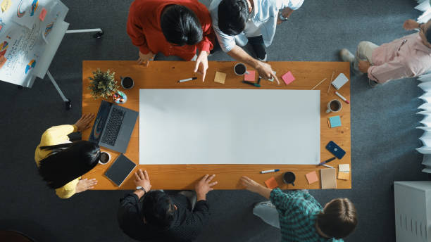 istock Top view of group walking at boardroom and brainstorming idea. Convocation. 2163500007