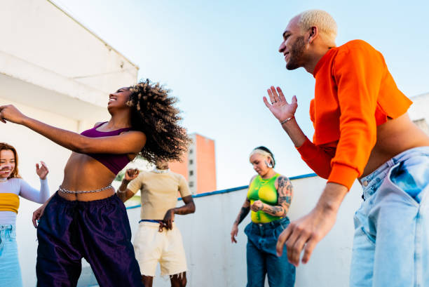 istock LGBTQIA+ Friends dancing at rooftop 2163502588
