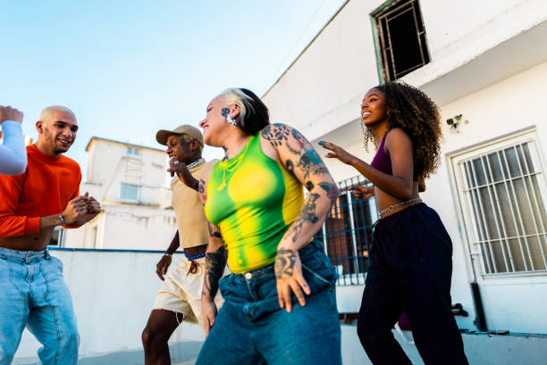 istock LGBTQIA+ Friends dancing at rooftop 2163502597