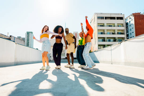 istock LGBTQIA+ Friends dancing at rooftop 2163502614