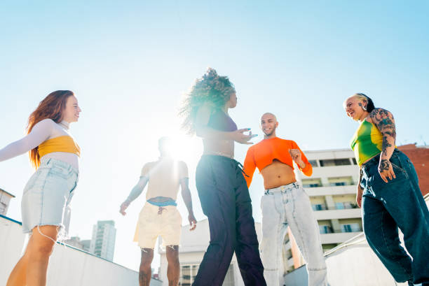 istock LGBTQIA+ Friends dancing at rooftop 2163502624