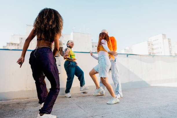 istock LGBTQIA+ Friends dancing at rooftop 2163502661