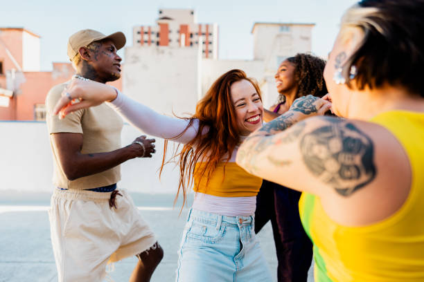 istock LGBTQIA+ Friends dancing at rooftop 2163502679