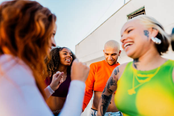istock LGBTQIA+ friends talking at rooftop 2163502680