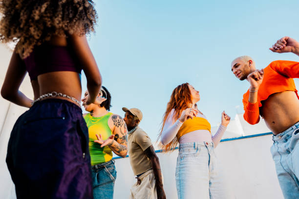 istock LGBTQIA+ Friends dancing at rooftop 2163502697