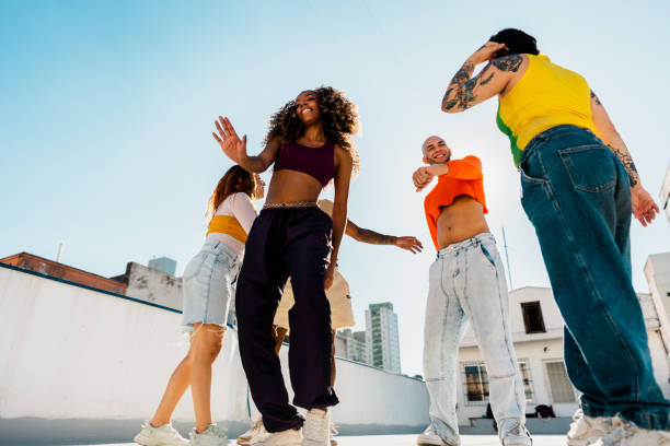istock LGBTQIA+ Friends dancing at rooftop 2163502707