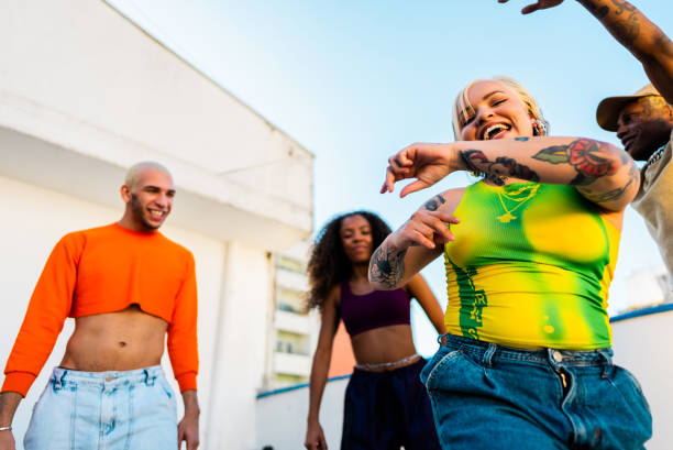 istock LGBTQIA+ friends dancing at rooftop 2163502884