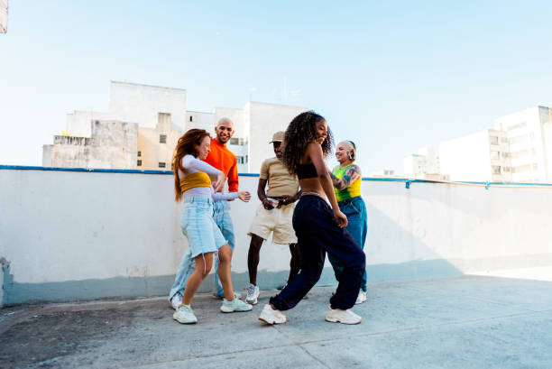 istock LGBTQIA+ friends dancing at rooftop 2163502931