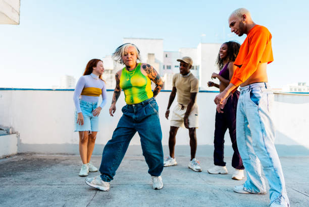 istock LGBTQIA+ friends dancing at rooftop 2163503000