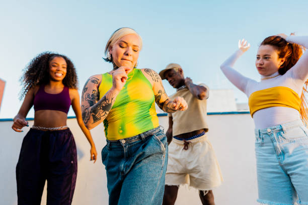 istock LGBTQIA+ friends dancing at rooftop 2163503164