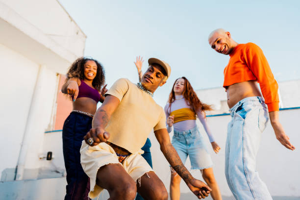 istock LGBTQIA+ friends dancing at rooftop 2163503165
