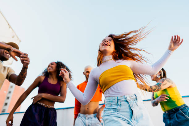 istock LGBTQIA+ friends dancing at rooftop 2163503671