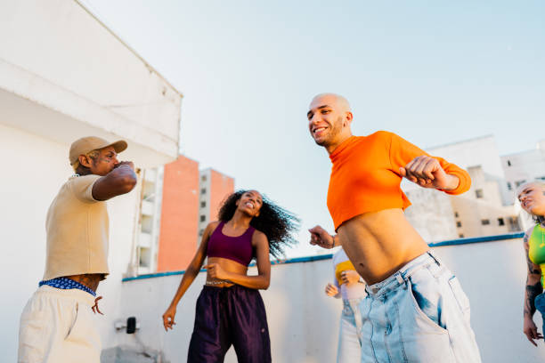 istock LGBTQIA+ friends dancing at rooftop 2163503673