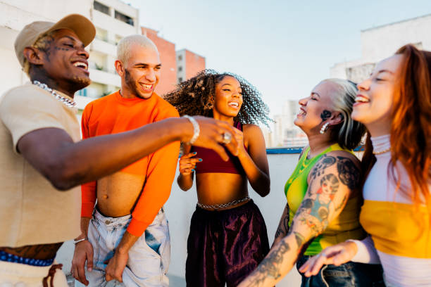 istock LGBTQIA+ friends dancing at rooftop 2163503680