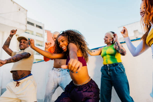 istock LGBTQIA+ friends dancing at rooftop 2163503686