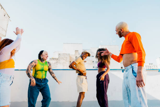 istock LGBTQIA+ friends dancing at rooftop 2163503689