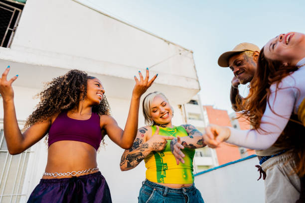 istock LGBTQIA+ friends dancing at rooftop 2163503698
