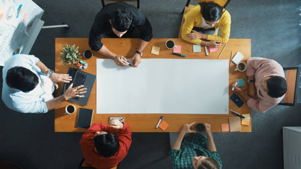 istock Top view of group walking at boardroom and brainstorming idea. Convocation. 2163505096