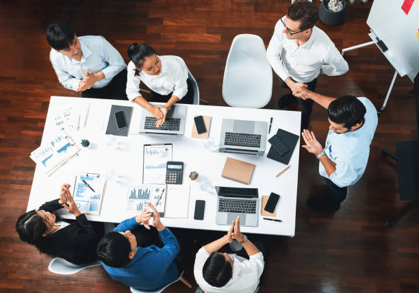 istock Group of diverse office worker employee shake hand and working together. Prudent 2163506476