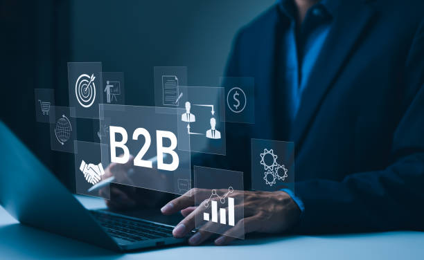 istock B2B business strategy concept. Businessman working with B2B virtual on laptop, conceptualizing strategy, partnership, targets in business to business services. E-commerce, B2B Marketing, enterprise, 2163506572