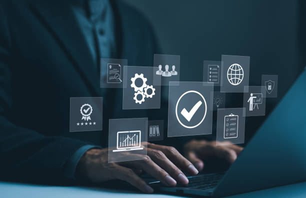 istock Standard quality control certification assurance guarantee concept. Businessman working with laptop and approve certificate. Quality assurance QA, Quality control QC, Compliance with regulations, 2163506574