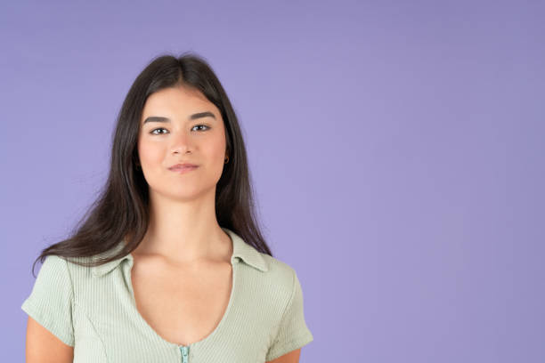 istock Happy woman looking at the camera relaxed 2163507371