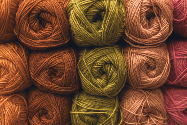 Several skeins of colored yarn at a craft store