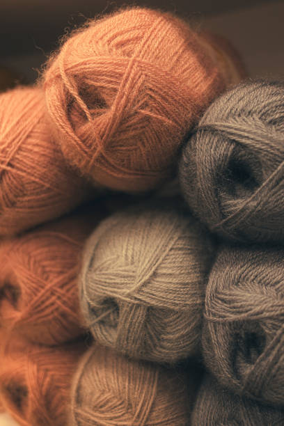 istock Several skeins of colored yarn at a craft store 2163511227