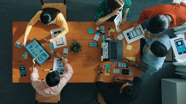 istock Top view of developer and designer shake hand together at meeting. Convocation. 2163513287