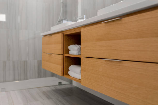 istock Light Wood Bathroom Vanity With Open Shelves And Neatly Folded Towels 2163515292