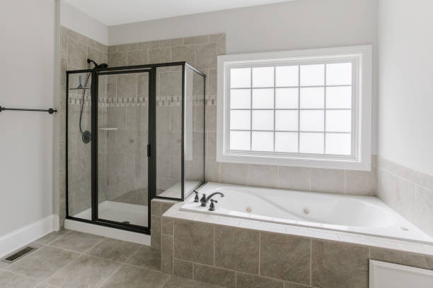 istock Modern Bathroom With Separate Shower, Bathtub And Natural Lighting. 2163515673