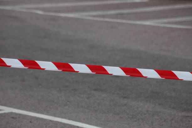 istock A red and white tape restraining people from an area 2163520381