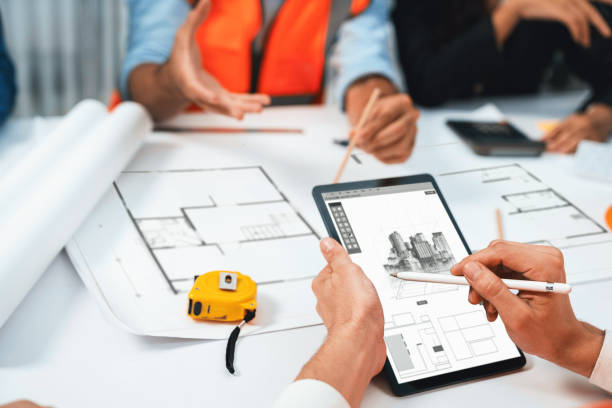 istock Diverse group of civil engineer and client working on architect. Prudent 2163521305
