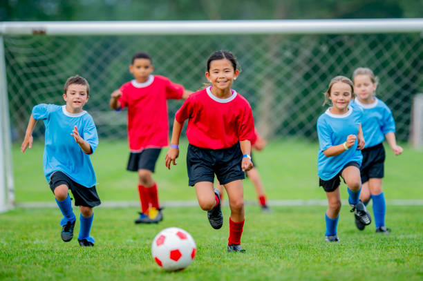 istock Children Playing Soccer 2163521841