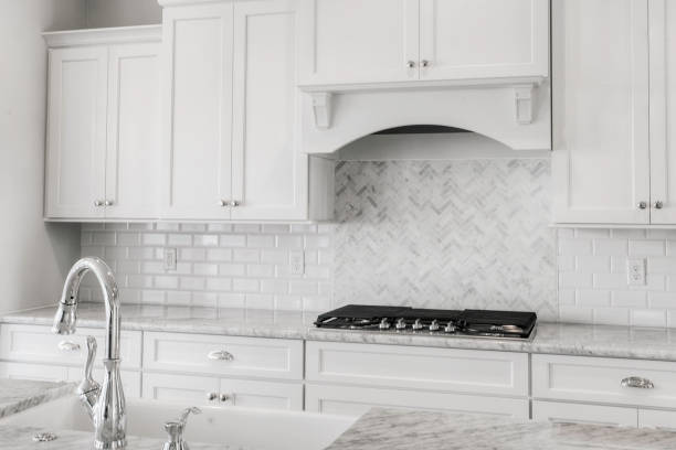istock Elegant Kitchen With Herringbone Backsplash And Marble Countertops 2163522778