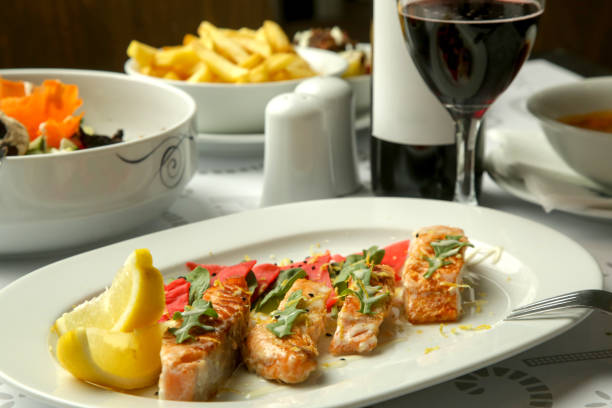 istock Grilled Salmon fillet with marinated vegetables served on the restaurant table 2163524321