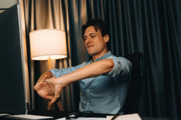 istock Sales manager working with stretching manner in working at night. Pecuniary. 2163527330